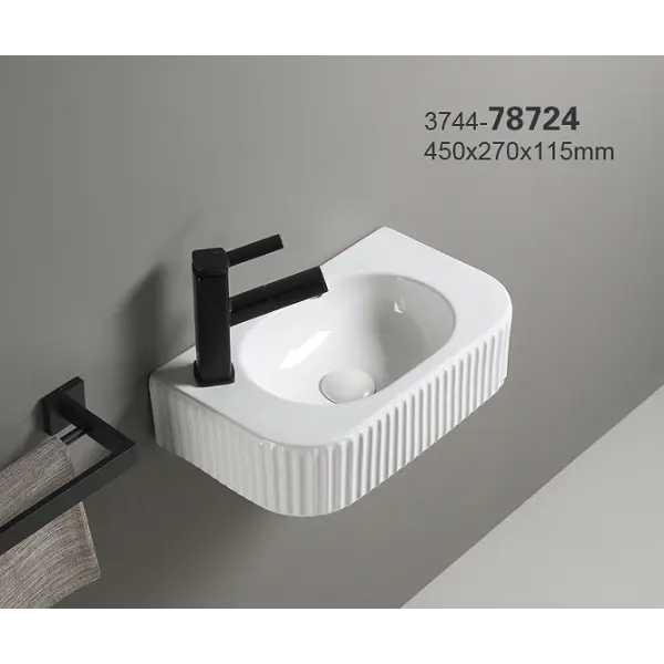 37-78724 KIMIC ZDJELASTI UMIVAONIK ovalni bijeli reljefni sa rupom 44,5x32,5x11,5cm