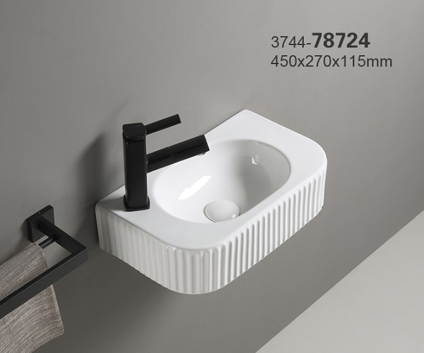 37-78724 KIMIC ZDJELASTI UMIVAONIK ovalni bijeli reljefni sa rupom 44,5x32,5x11,5cm
